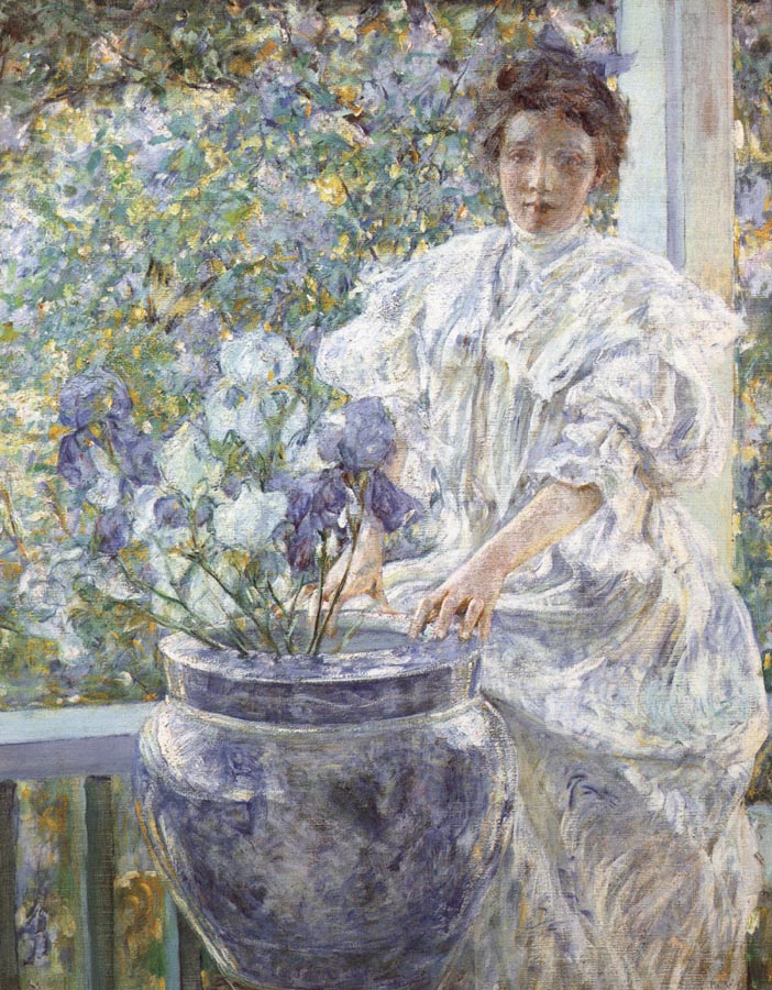Woman with a Vase of Irises